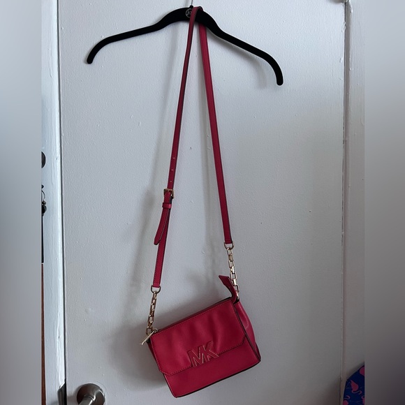 Michael Kors coral small purse could be used as a crossbody - Picture 2 of 7